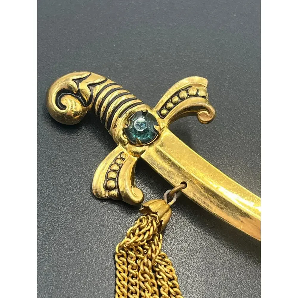 Coro Vintage Signed Gold‎ Tone Sword Dagger Brooch With Tassels and Green Stone